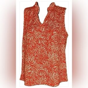 Women’s sleeveless blouse/ slightly ruffled collar. Orange/white tropical.Size S